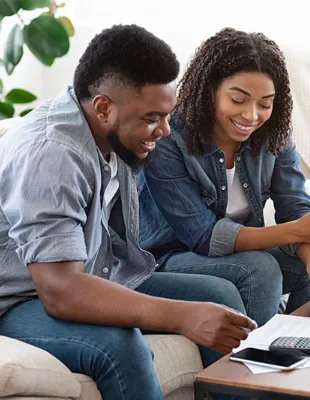 Couple reviewing the first time homebuyers guide